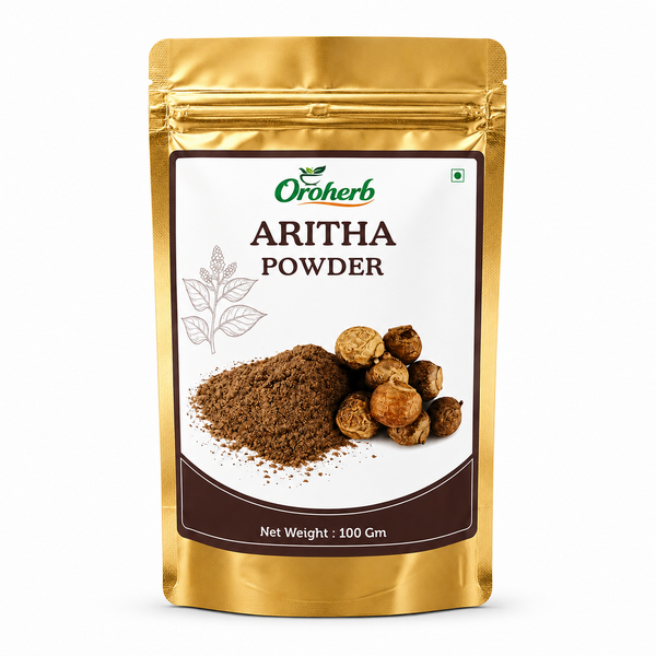 Oroherb Aritha Powder in a metallic gold stand-up pouch with a white and brown label, showing a pile of dark brown powder and whole aritha beans on a white background.